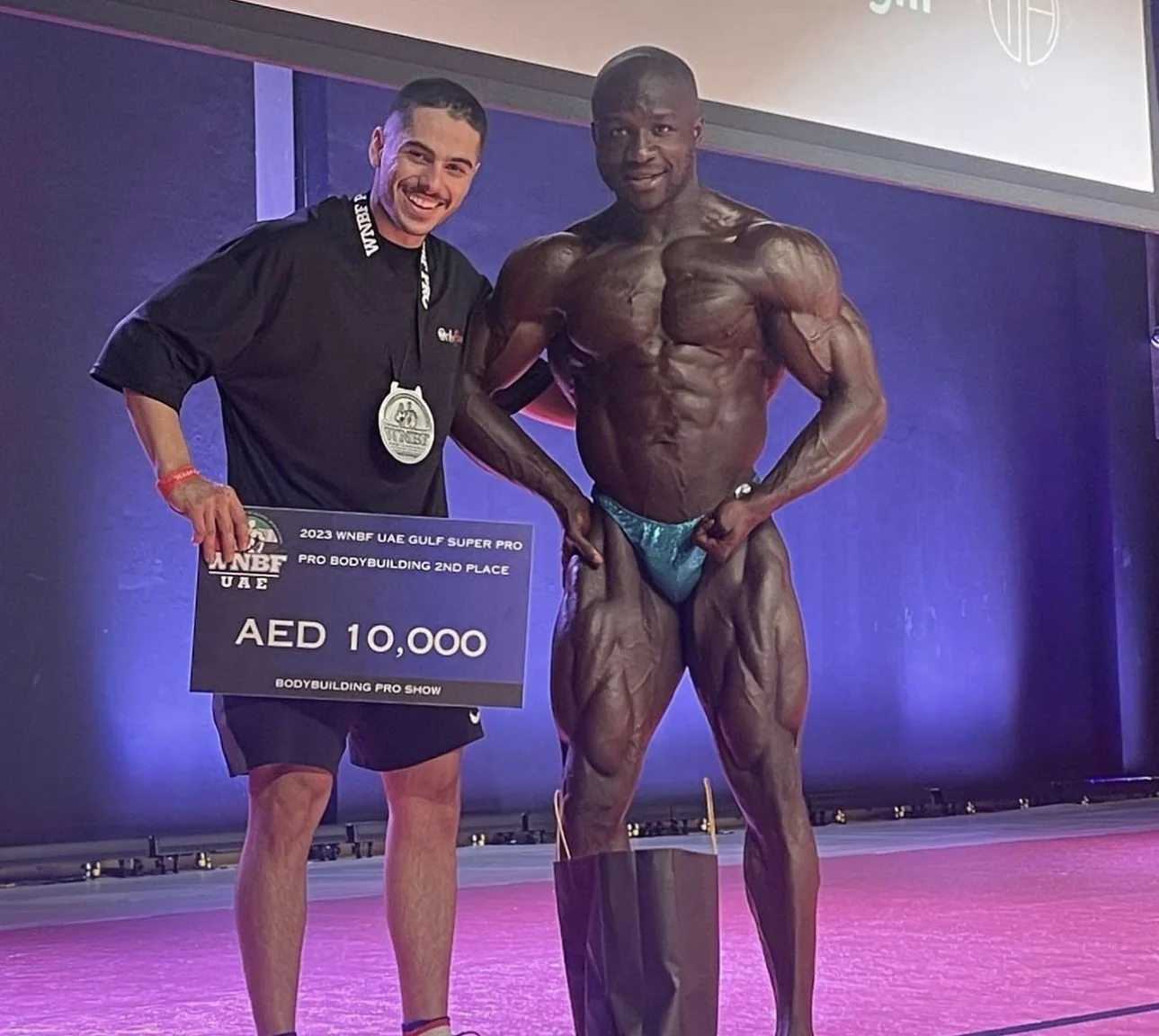 Emad Deznabi on stage as a WNBF Pro