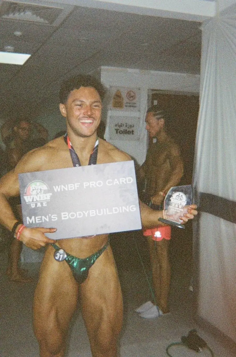 Emad Deznabi on stage as a WNBF Pro
