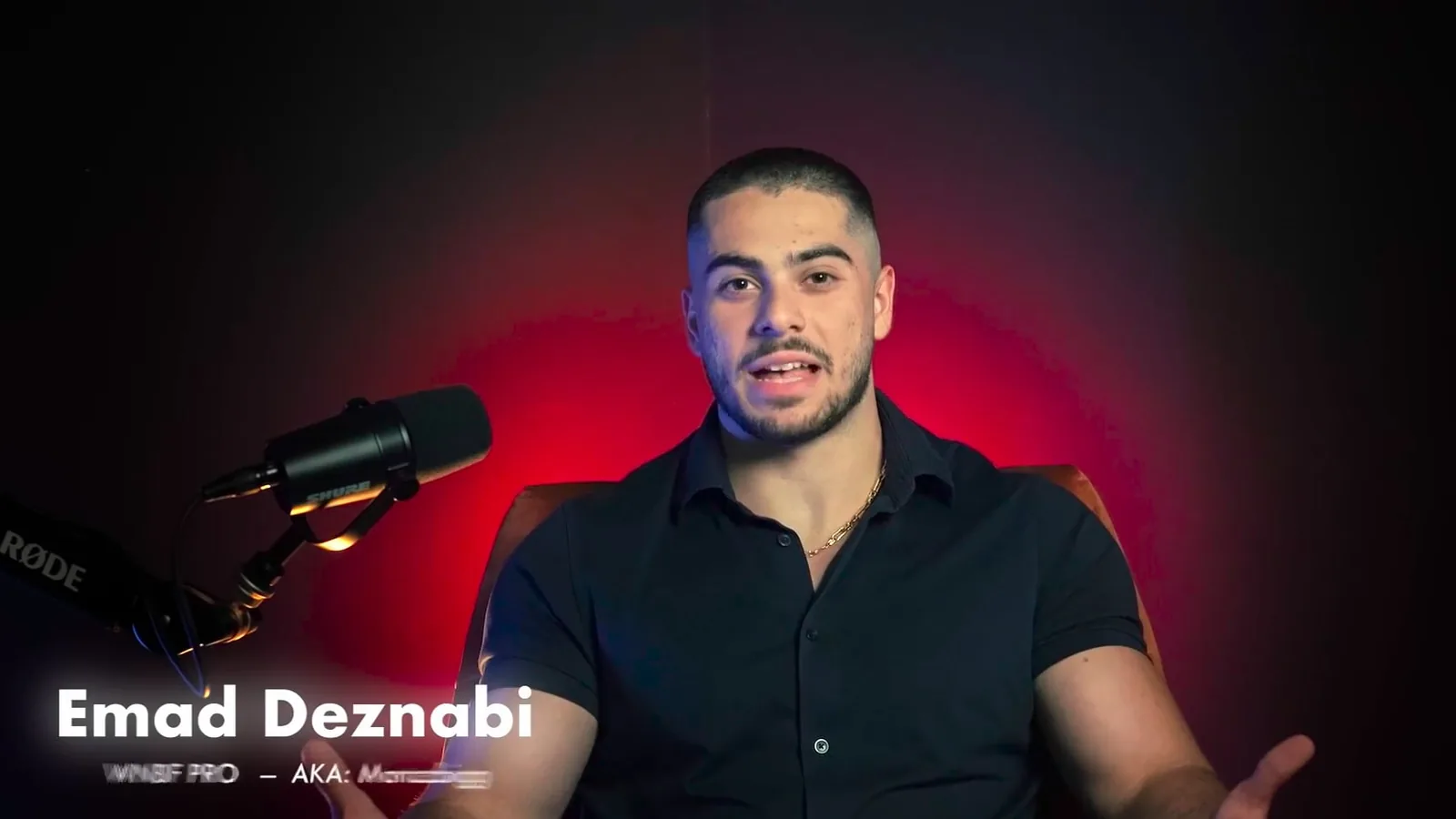 Emad Deznabi at the microphone, the opening frame of the film